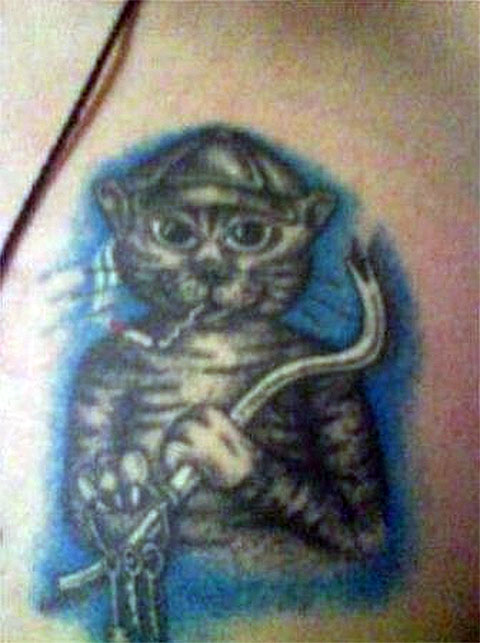 Значение татуировок с изображением кошки